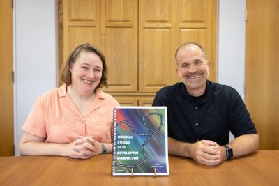 (From left) Anita Walz, assistant director of open education and scholarly communication librarian, and Derek Shapiro, director of bands and assistant professor of music. 