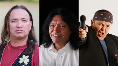 This is a composite of three separate images. From left are Comedian Jim Ruel, a middle aged Indigenous man with long straight brown hair, wears a red long-sleeved T-shirt under a black floral patterned vest and looks towards the camera. The photo was taken outside. Indigenous comedian Marc Yaffee, a middle aged Native man with shoulder-length dark brown hair, wears a white button down shirt in front of a black background and smiles towards the camera. Indigenous comedian Ernest Tsosie, a Native middle aged man in a blue T-shirt and black blazer with a black and white patterned bandana tied around his head, winks one eye and holds a microphone towards the camera.